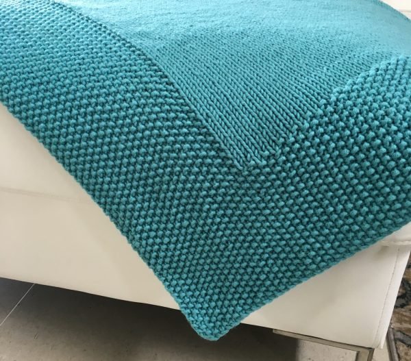 Sometimes beauty lies in simplicity. That is certainly true with this blanket. Easy Knitted Blanket!