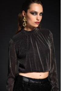 Radiance blouse by Peace + Chaos in black semi-sheer fabric with metallic threads, styled with glam statement earrings.