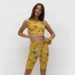 σε print JOY. Άνετη εφαρμογή από ανακυκλώσιμο ύφασμα* που απομακρύνει τον ιδρώτα και τέλεια στήριξη κατά την διάρκεια της προπόνησης. Απαλό και άνετο στην κίνηση. Σημείωση: Το μοντέλο της φωτογραφίας είναι Μέγεθος: 12 *Ανακυκλώσιμο υλικό